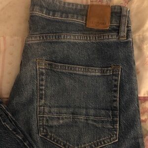 We The Free Straight Leg Jeans - Blue with Brown Patch